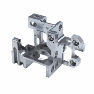 Precision CNC machined alloy steel bracket housing, complex multi-cavity component with bearing bores, linear guide slots and threaded mounting holes — custom alloy steel machining