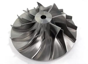 Custom titanium alloy compressor impeller manufactured by 5-axis simultaneous CNC machining, precision centrifugal wheel for aerospace and energy turbomachinery